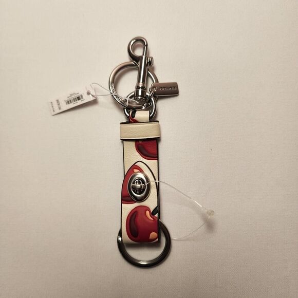 NWT Coach CZ088 Trigger Snap Bag Charm Cherry Print Chalk White Red Keychain - Picture 1 of 3